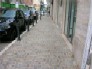 Nuovo asfalto in via Ugo Bassi. In fase di progettazione i marciapiedi sul lato nord di via Torino